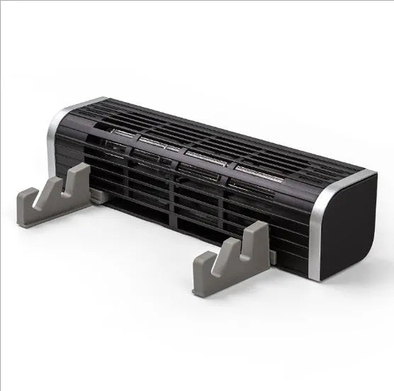 Black aluminium notebook cooling pad with USB cable and integrated fan for laptops.