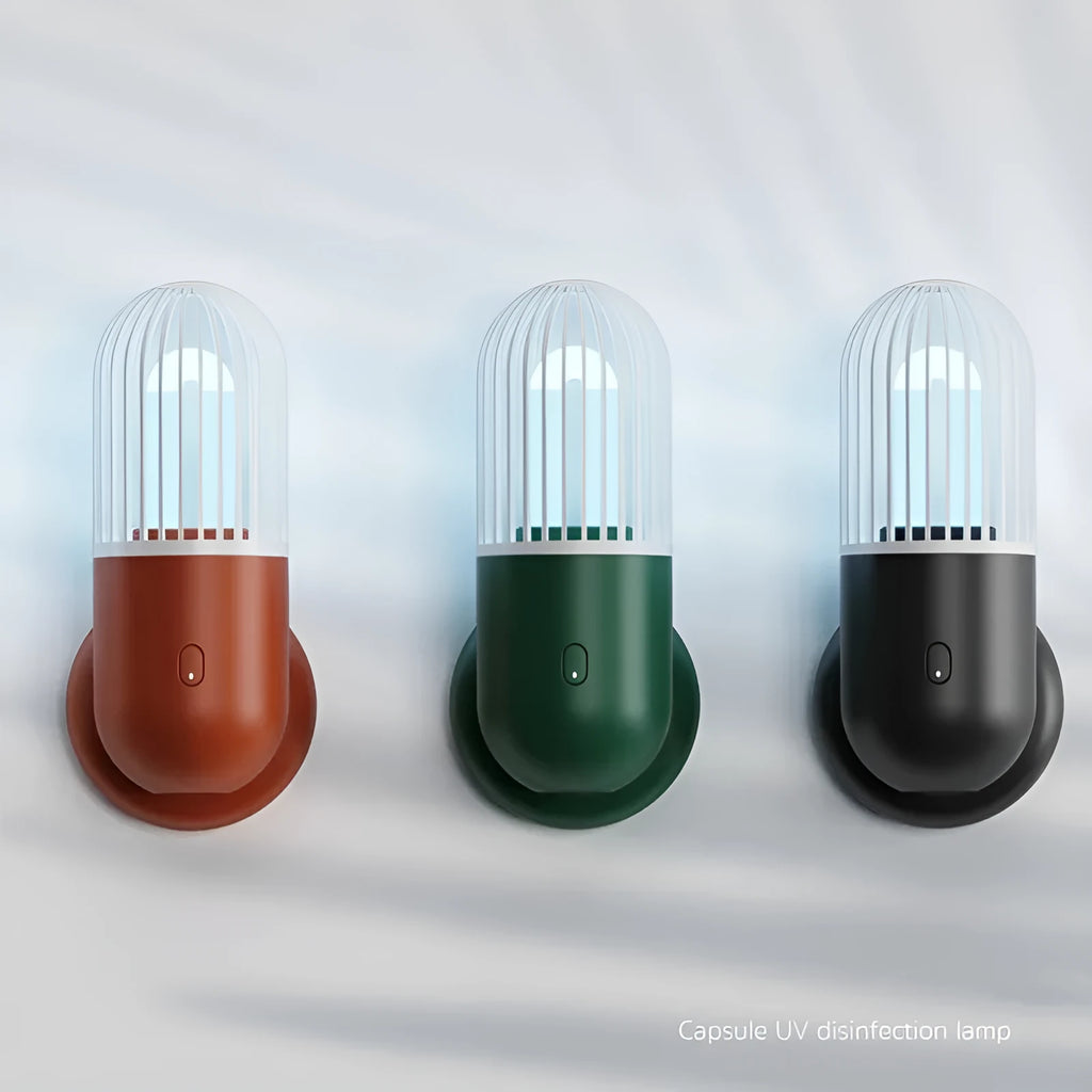 Portable capsule ultraviolet disinfection lamp in black, brown, green or white with display showing 52x52x136mm dimensions