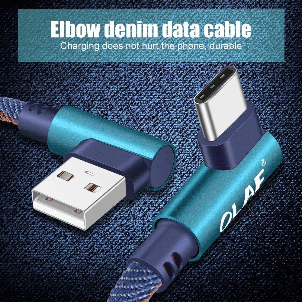 Fast charging USB cable with denim textile exterior and aluminium connectors in black, blue, and red.