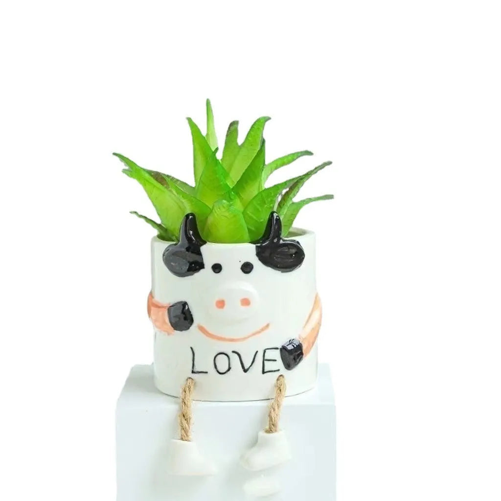 Ceramic hanging foot flowerpot for succulent plants on desktop