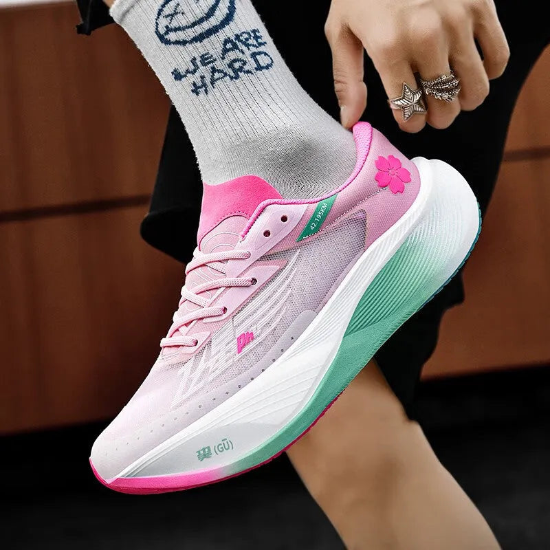 Low-top racing sneaker with carbon plate technology, PU mesh upper, and natural rubber sole in multiple colour options.