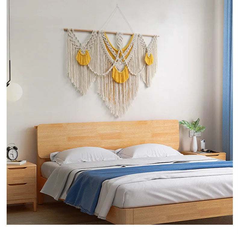 Hand-made cotton Nordic tapestry wall hanging in creamy white with yellow accents, 120cm by 95cm
