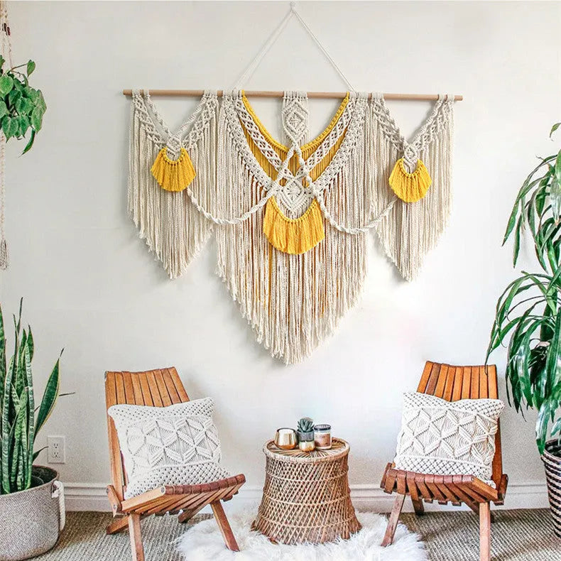 Hand-made cotton Nordic tapestry wall hanging in creamy white with yellow accents, 120cm by 95cm