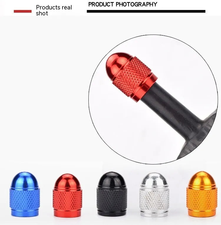 Aluminium alloy mountain bike tyre valve cap in multiple colour choices on a bicycle wheel.