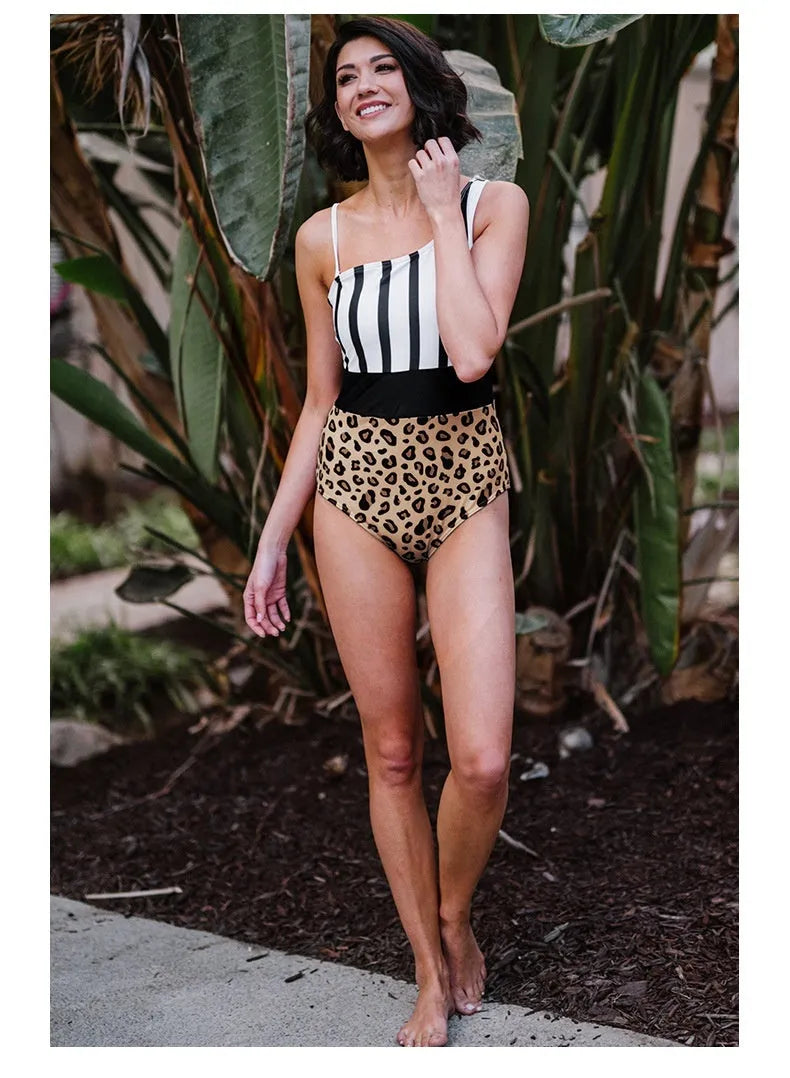 Women's leopard print one-piece swimsuit with an asymmetric collar and high waist triangle design.