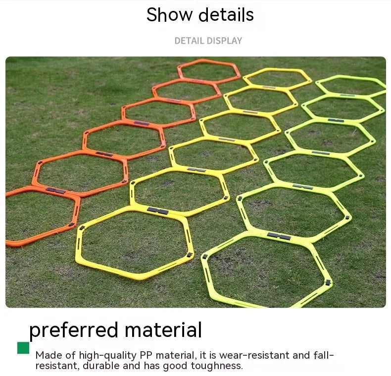Six foldable yellow, green, and orange hexagon football agility training rings laid out on grass.