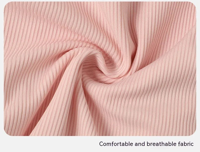 Pink women's conservative one-piece swimsuit made from nylon fabric on a mannequin.