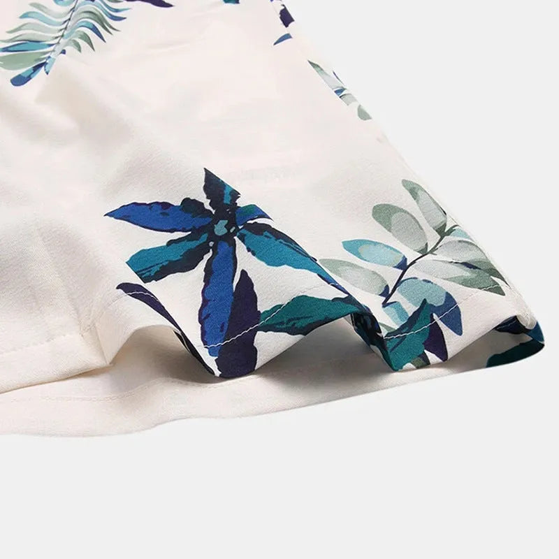 White casual printed cotton shirt with lapel collar and short sleeves, loose fit