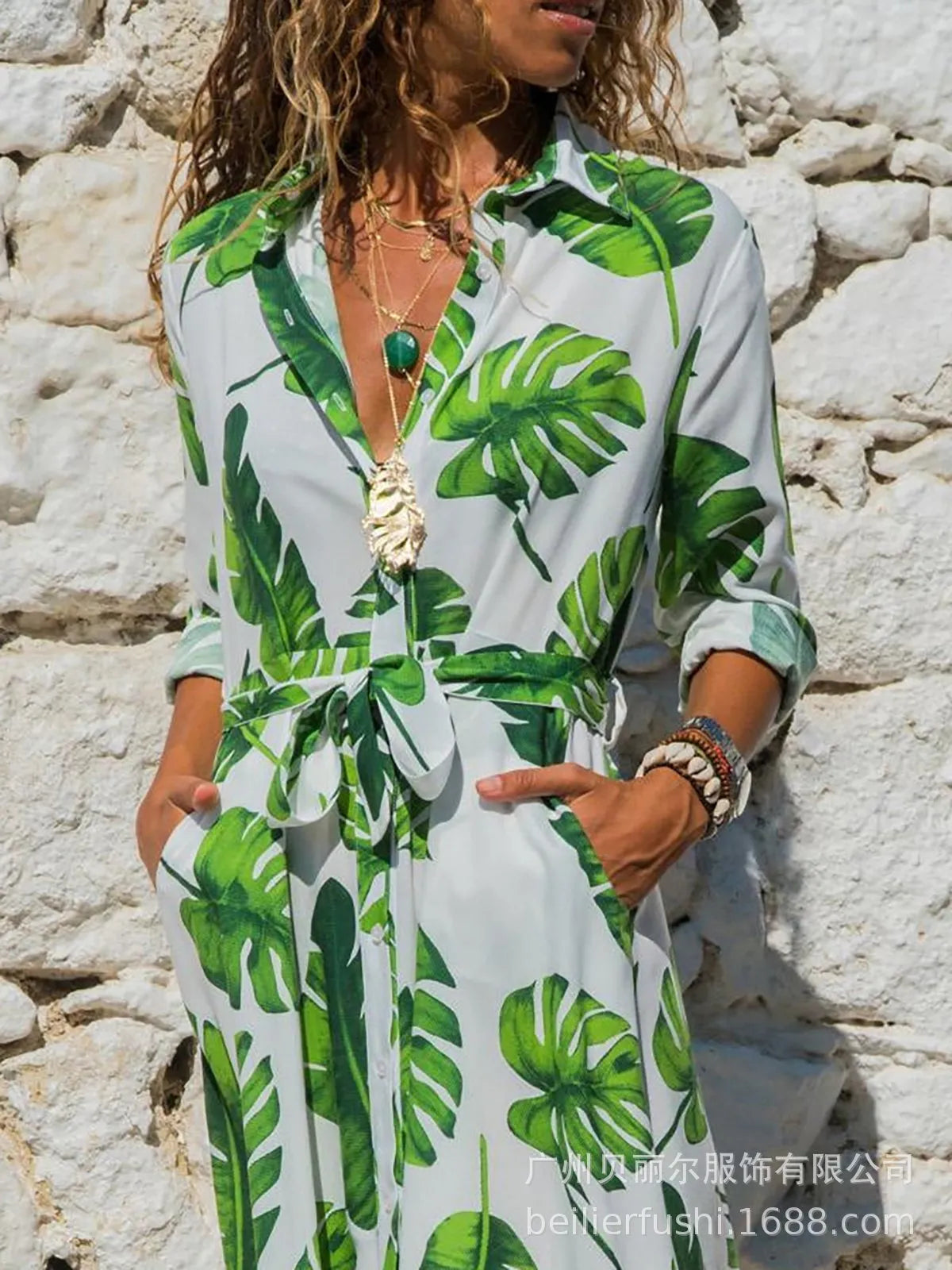 Women's V-neck chiffon dress with high waist and A-line skirt in a printed pattern.