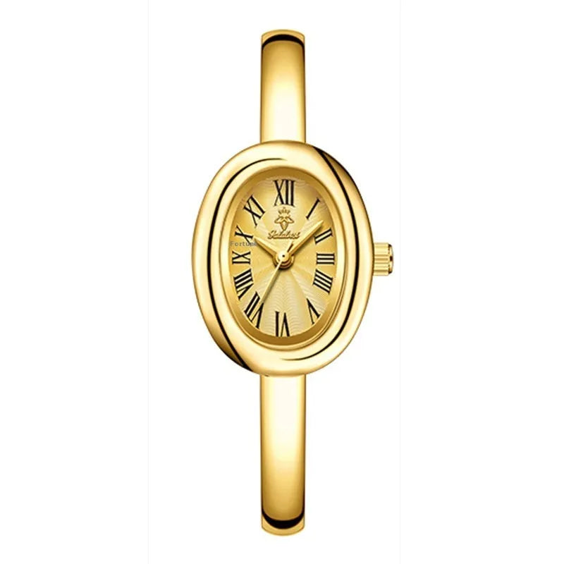 Women's oval retro quartz watch with 8mm thickness showing gold and silver colour options with spiral patterns