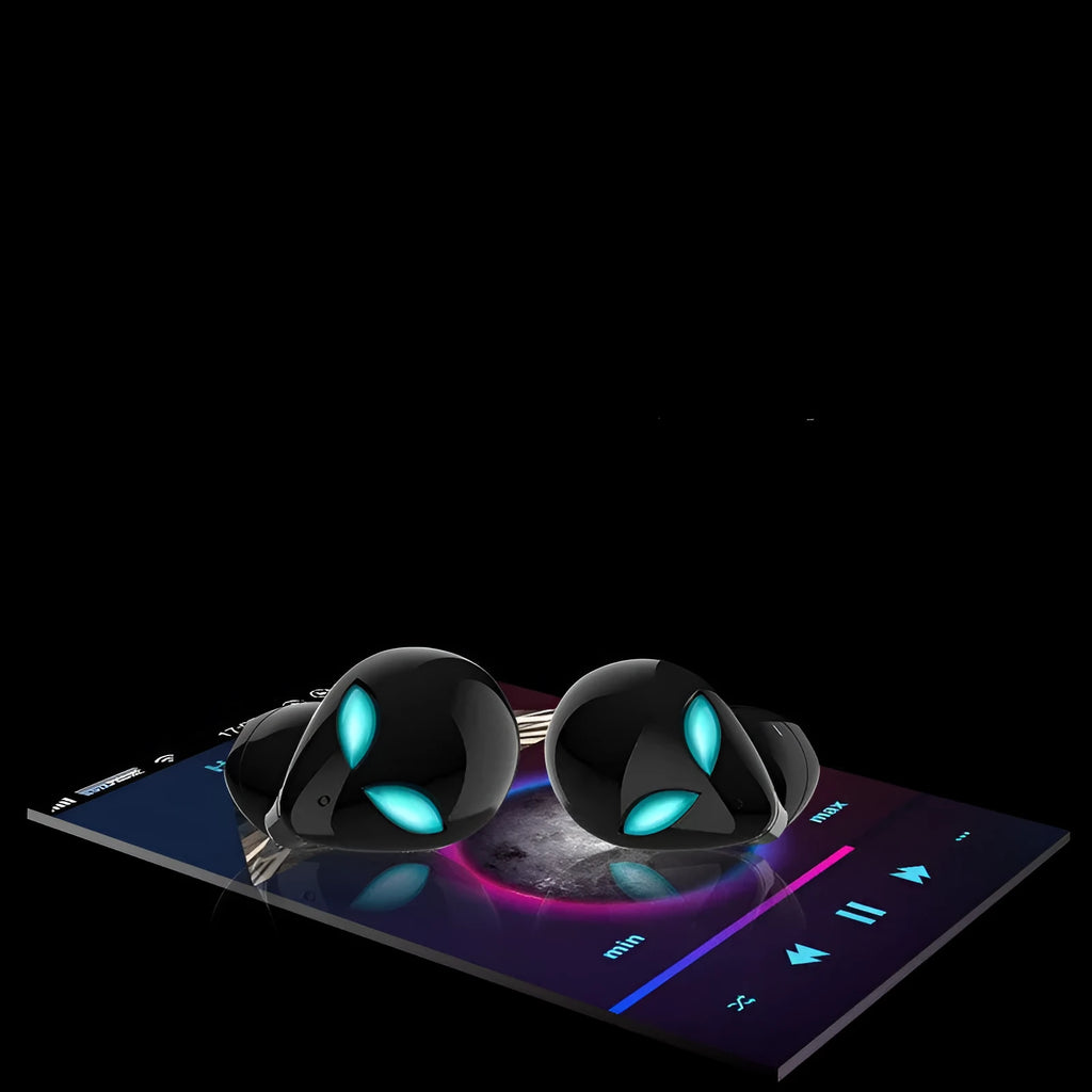Alien-themed Creative Outer T8 Starman black wireless earbuds with red LED lights next to charging case.