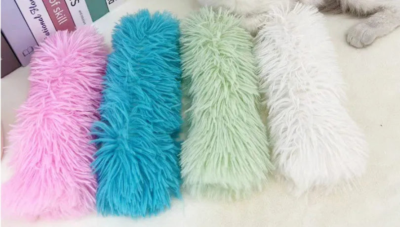 Soft plush cat toy pillow measuring 27x10cm available in blue green pink and white colours for pet play