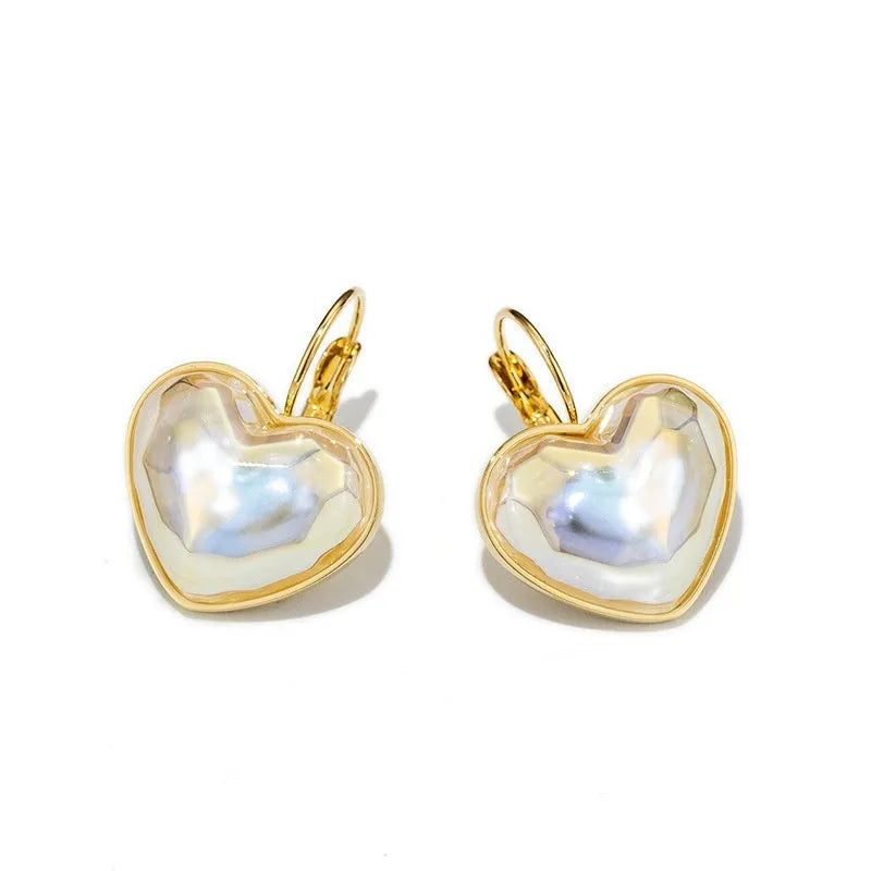 Gold-coloured clip-on earrings with natural style design for women