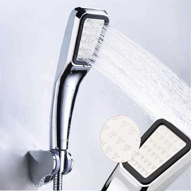 Orange hand-held pressurised shower with rain function for standard water pressure systems