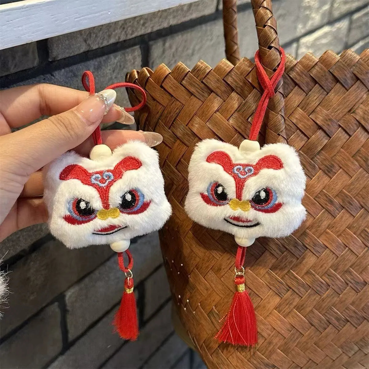 Chinese style plush lion keychain ornament with star stone details in blue or yellow colour