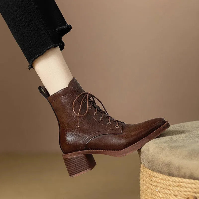 Women's black pointed-toe short tube boots with 13cm sock length and artificial PU upper