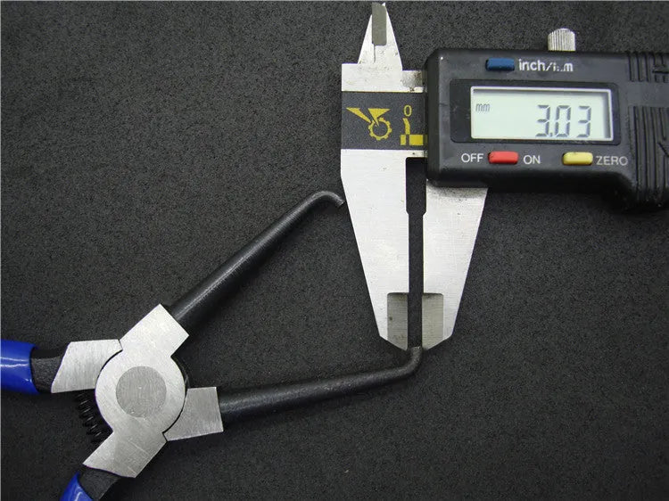 Iron and rubber caliper tubing pliers for automotive fuel line maintenance, shown in L and S sizes.
