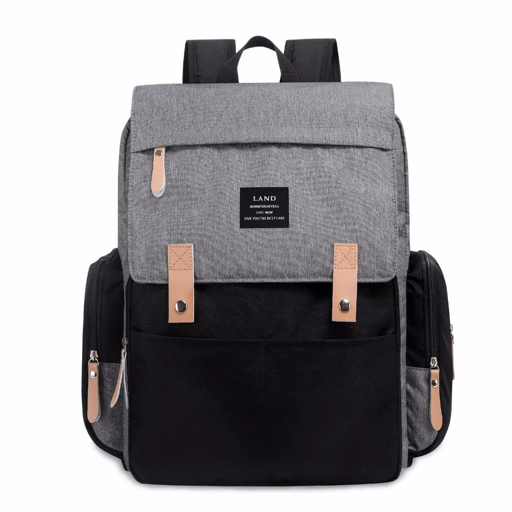 LAND Mommy Diaper Bag Backpack in oxford cloth with changing mat, shown in beige colour.