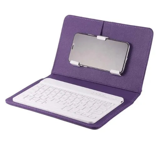 Wireless Bluetooth keyboard case for 7-inch tablet showing integrated keyboard and protective shell