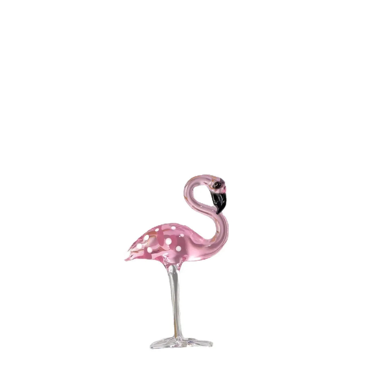 Pink crystal flamingo decorative ornament on table, available in separate or parallel styles.
