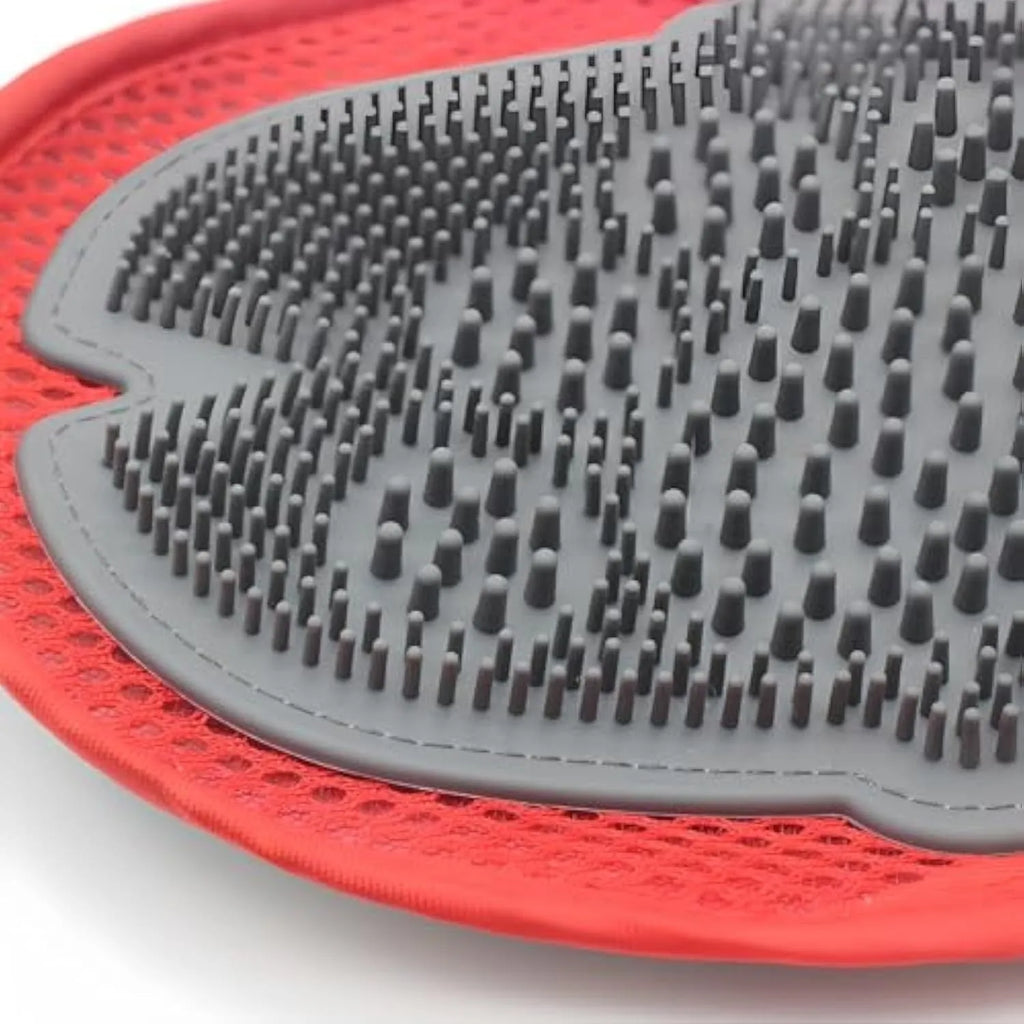 Red pet bathing glove with integrated brush for gentle grooming during wash time
