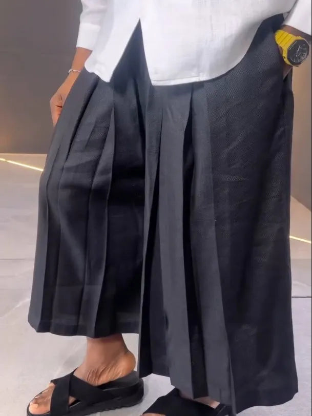 White asymmetric front shirt with black pleated pants women's co-ord set