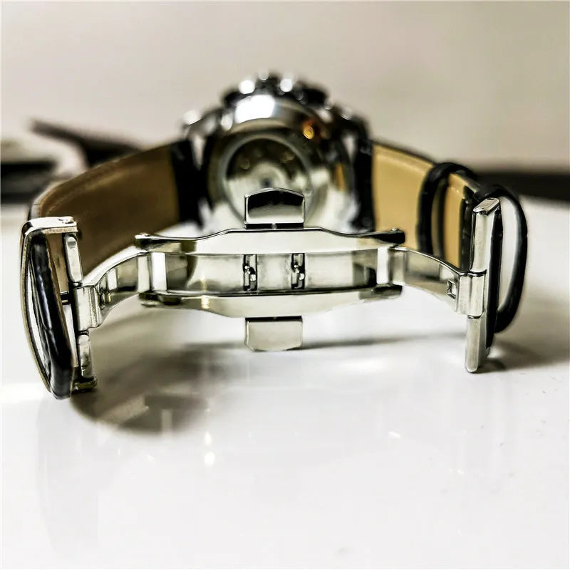 Men's automatic mechanical watch with 12mm case in black steel, silver, and gold finish options.