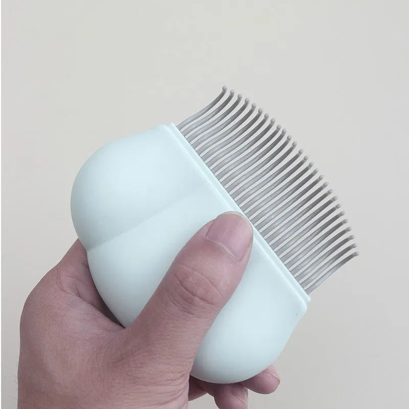 Blue deshedding brush grooming tool for cats and dogs measuring 9cm by 9cm