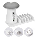 White 5-port USB charging dock station with integrated mushroom-shaped LED night light on a desk