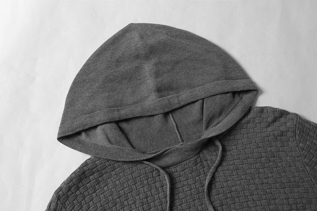 A man's plain hooded sweatshirt in a cotton-polyester blend, shown in multiple colour options.