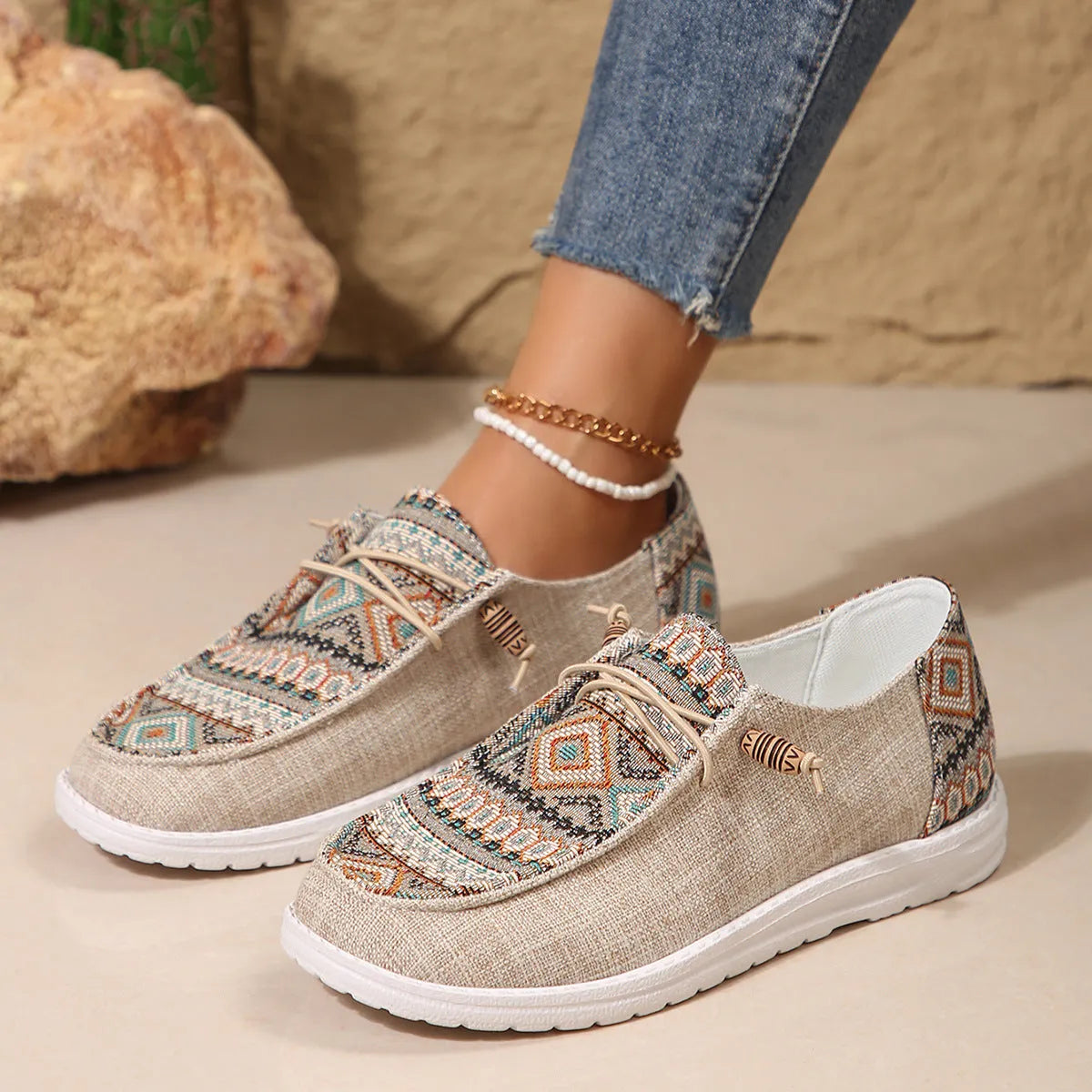 Women's flat round toe low-top shoes in black, dark grey, and khaki colours