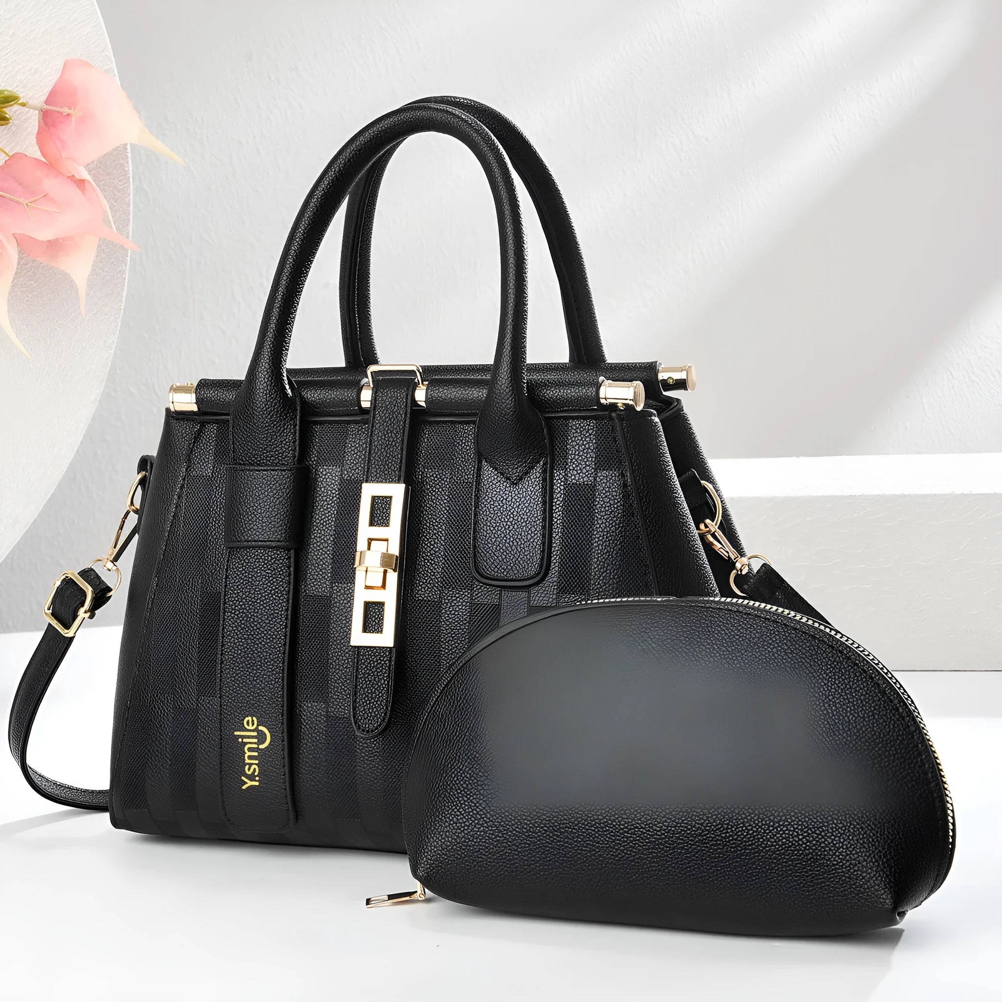 Round black PU leather crossbody bag with adjustable strap on a mannequin, showing zip closure.