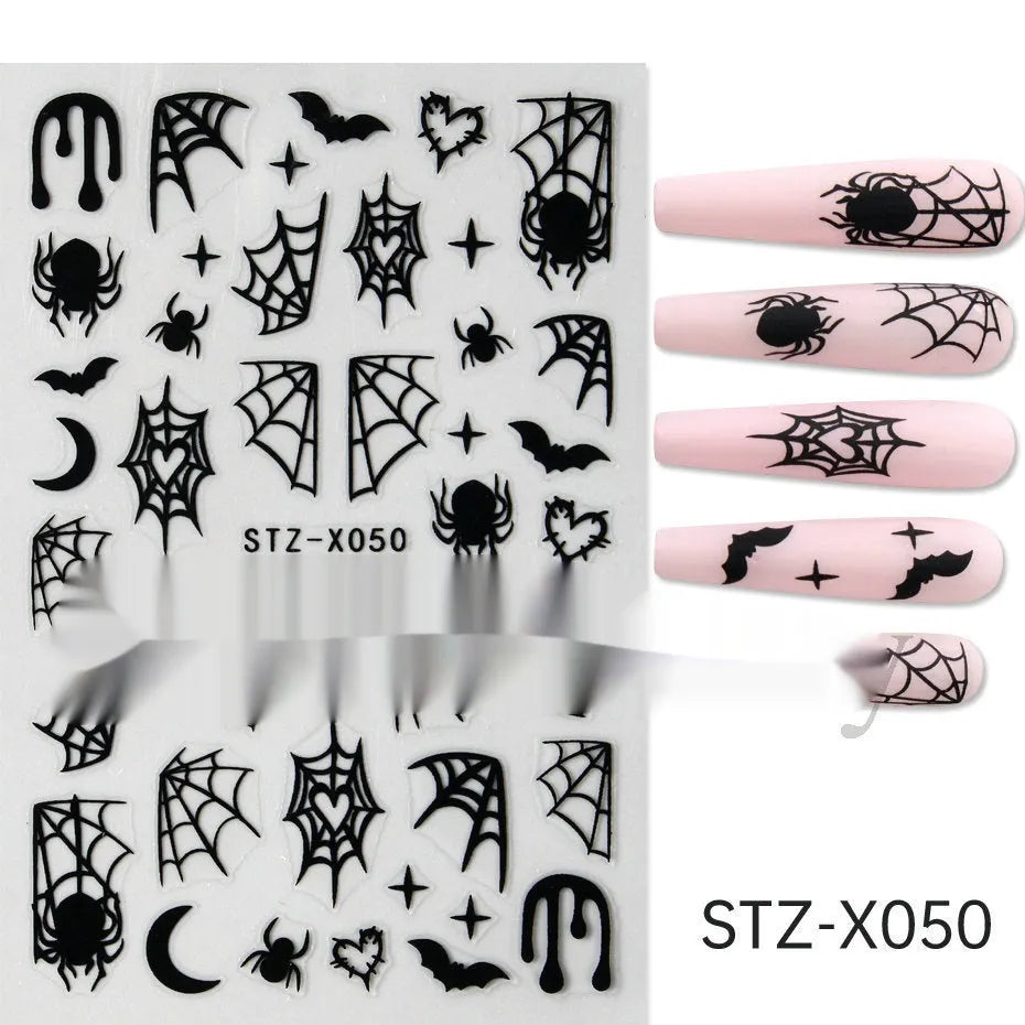 Sheet of black and silver love heart pattern nail art stickers with a plastic nail patch.