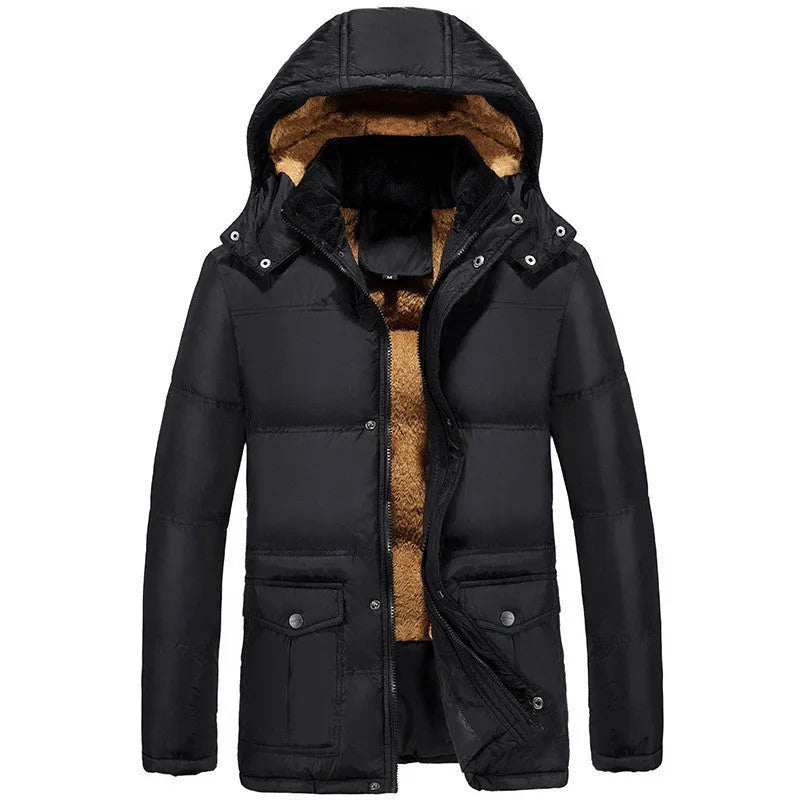 Men's black velvet padded jacket with hood and double-breasted buttons, showing loose fit.