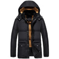 Men's black velvet padded jacket with hood and double-breasted buttons, showing loose fit.