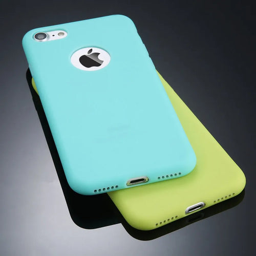 Candy colour soft silicon TPU back cover case for iPhone on a plain background.