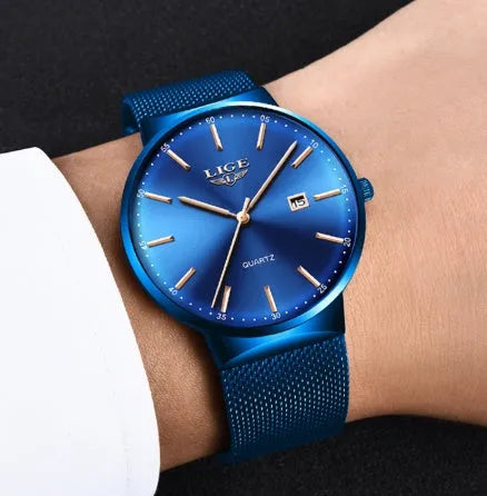 Men's stainless steel watch with a 40mm dial shown in black, blue, and two-tone colour options