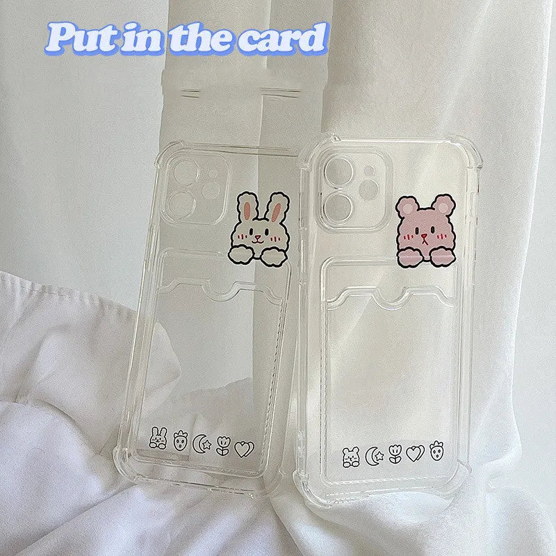 Transparent cartoon-themed iPhone case with a card slot, shown on an iPhone.