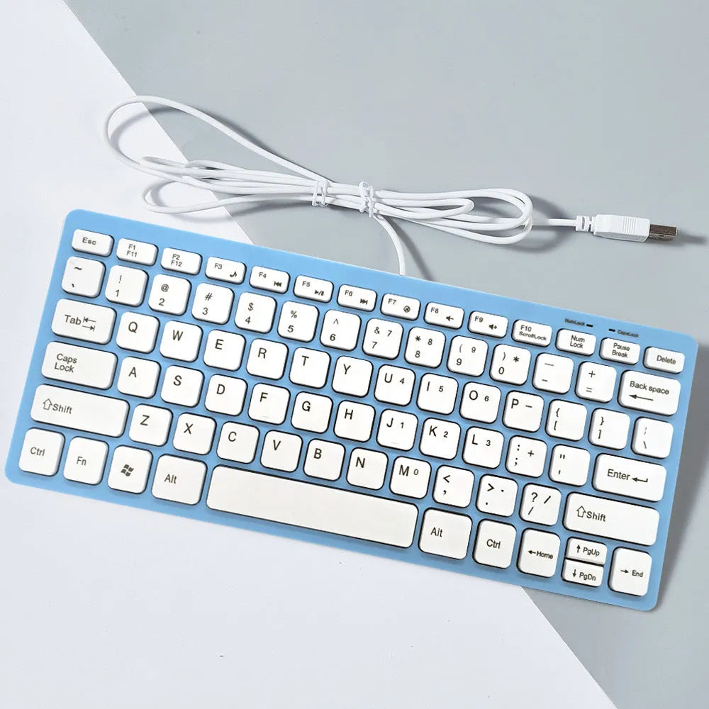 Mini wired USB computer keyboard in black, white, pink, or blue colour options.