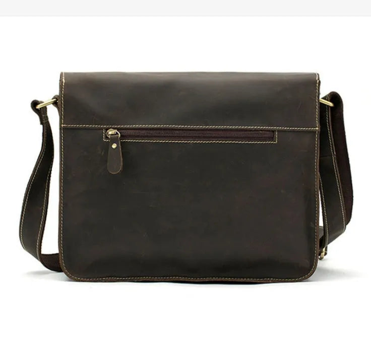 Leather vintage messenger bag in brown colour with adjustable strap and flap closure