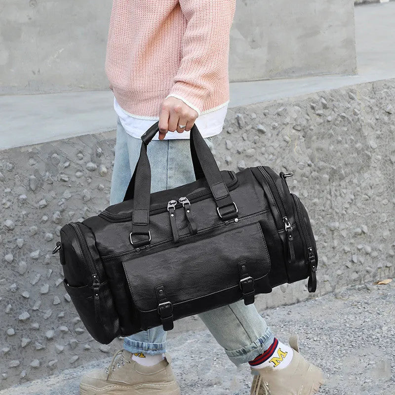 Large black travel shoe bag for organising footwear, measuring 52cm by 19cm by 27cm