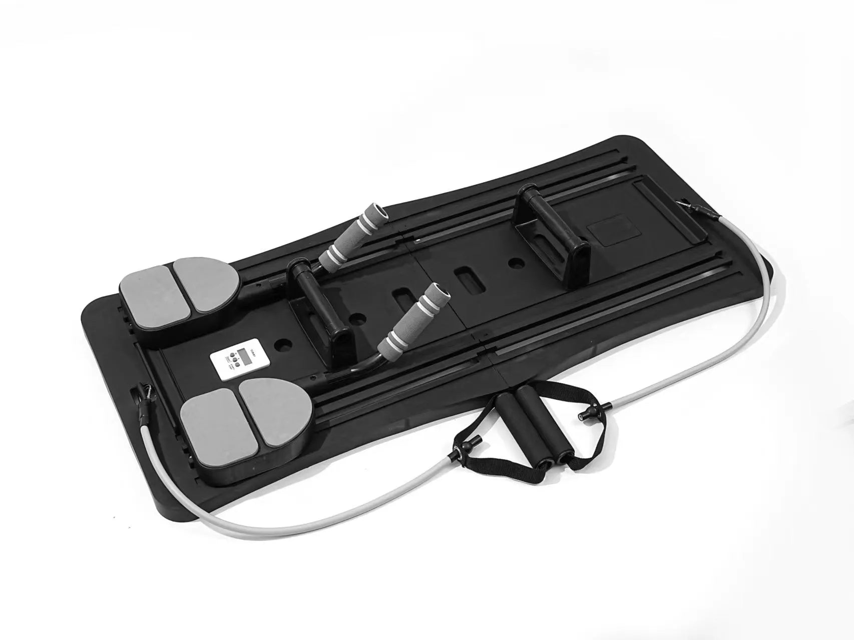Purple foldable plastic belly panel fitness board on a wood floor.