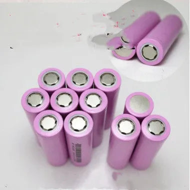 Single 18650 format 3.7V 2600mAh lithium-ion rechargeable battery cell on a white background.