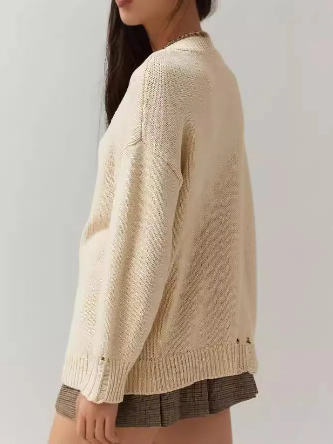 Women's beige jacquard knit pullover sweater with round neck and long sleeves