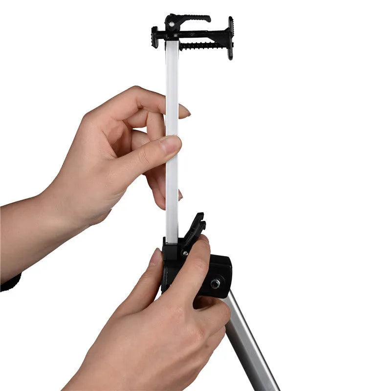 Silver aluminium alloy adjustable painting easel on floor with canvas, folded length 21 inches