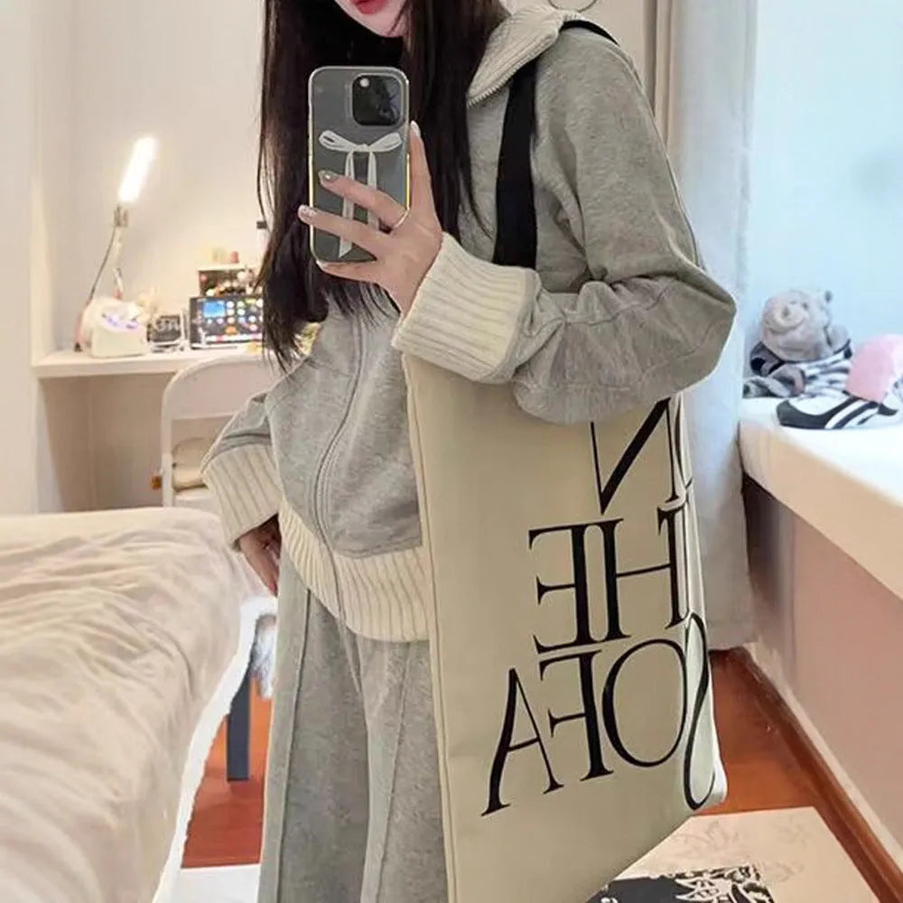 Light gray women's two-piece casual set with coat and wide leg trousers