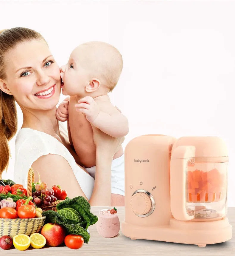 Baby food processor with steamer and blender functions in green or pink, showing dual mixing blades