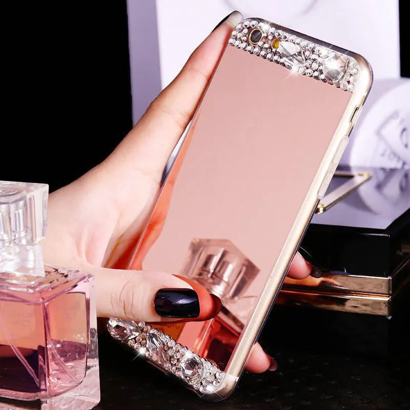 Gold rhinestone silicone back case on a Huawei smartphone.