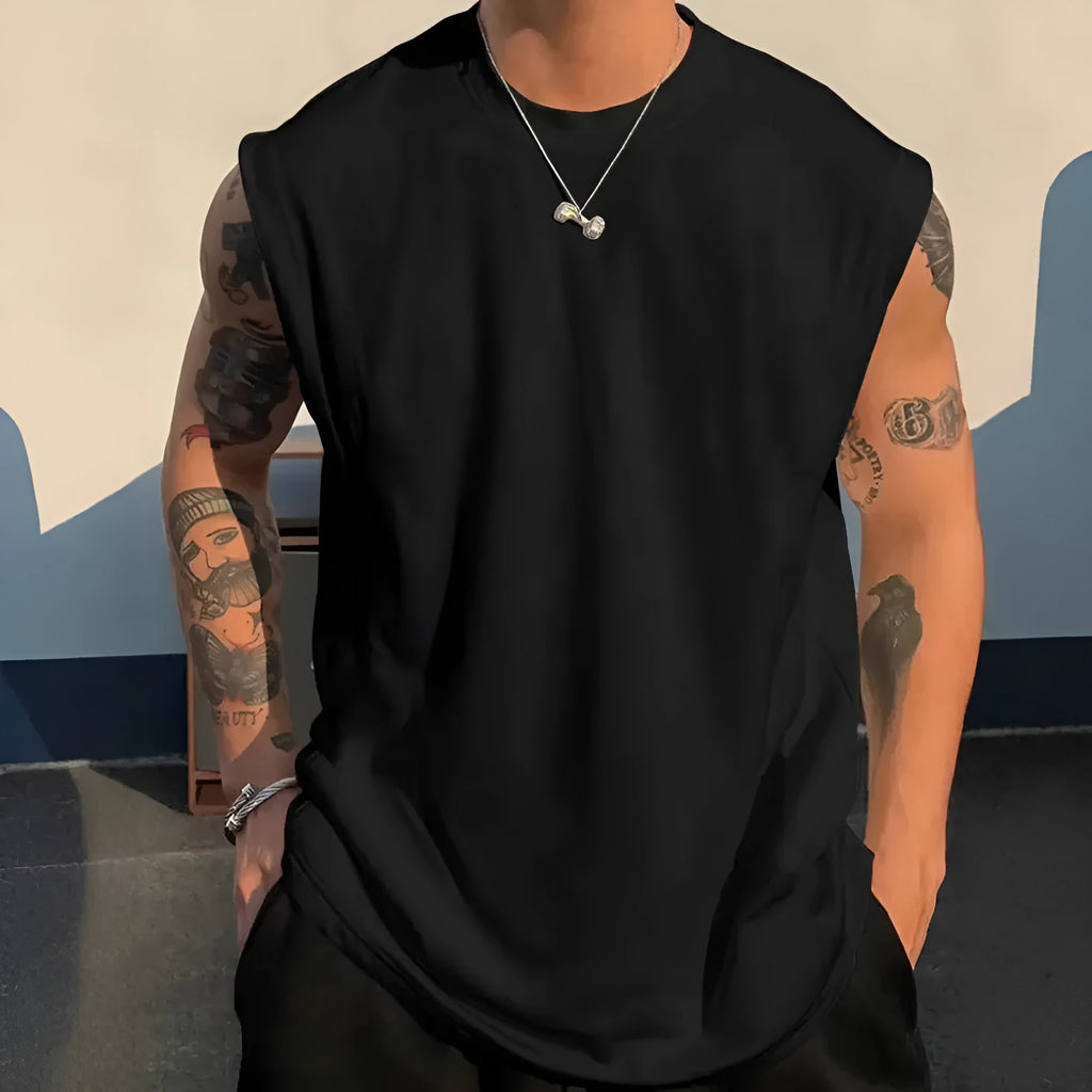 Men's loose solid colour cotton tank top sleeveless t-shirt on a hanger.