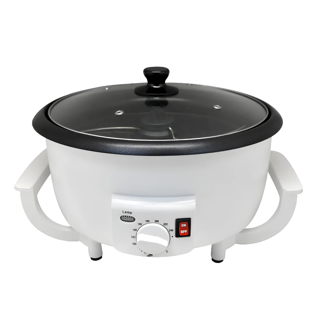 White electric coffee bean roasting machine with 750g capacity and oblate drum design on kitchen counter